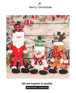 Detailed view of knitted Santa, Snowman, and Reindeer covers for Christmas wine bottles