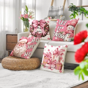 Lot de 4 housses de coussin de Noël roses en lin avec Père Noël sur canapé beige