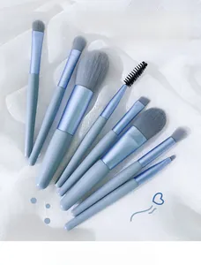 Detail shot of 8-piece sky blue travel makeup brush set with synthetic fiber bristles