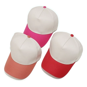 Detail view of reinforced stitching on multi-color five-panel baseball caps in twill cotton