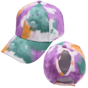 Detail of colorful tie-dye ponytail baseball cap featuring high messy bun opening
