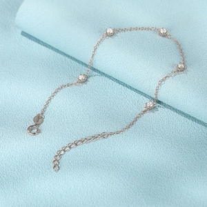 Detailed macro view of S925 sterling silver bracelet with five sparkling zircon stones