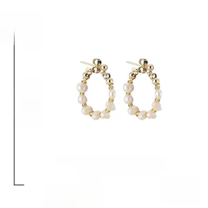Detail showing freshwater pearl hoop earring dimensions 4cm x 2.4cm and S925 silver needles