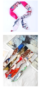 Detail view of assorted narrow silk scarves with elegant horse carriage patterns