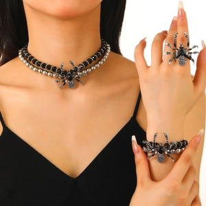 Gothic spider jewelry set featuring rhinestone necklace, bracelet and ring on model