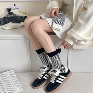 Striped cotton crew socks with bear embroidery and classic black and white pattern