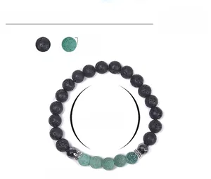 Makroaufnahme der 8mm Lavastein und grünen Achatperlen auf dem ätherischen Öl-Armband