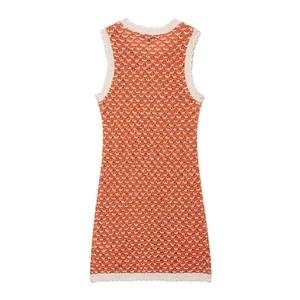 Women's orange and white knit mini dress with hollow out textured pattern and round neck