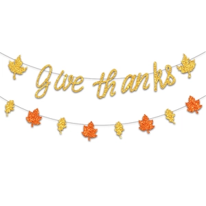 Golden glitter Give Thanks banner with maple leaves for Thanksgiving party venue decor