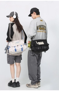 Dual messenger bags in beige and black shown on models highlighting large capacity