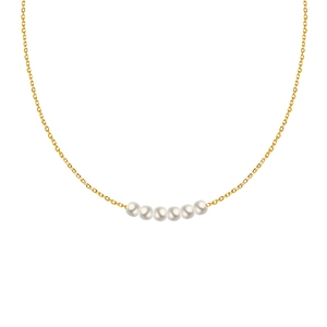 Minimalist gold titanium necklace with six white pearls in a curved smile pendant design