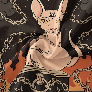 Close-up of printed gothic fabric showing Sphinx cat detail and soft textile texture
