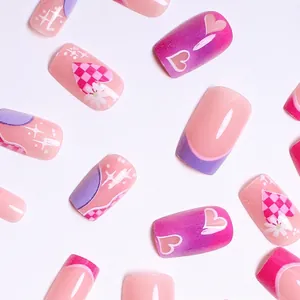 Barbie pink and heart pattern press-on nails set with french tips and daisy designs