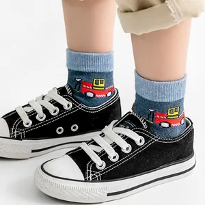 Toddler boys navy cotton socks with fire truck jacquard pattern and light blue rib cuffs