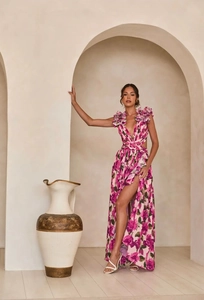 Detail of floral maxi dress with deep V-neck, ruffle sleeves and high slit in pink floral