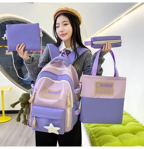 Detailed view of 4-piece purple schoolbag set including backpack and accessories on model