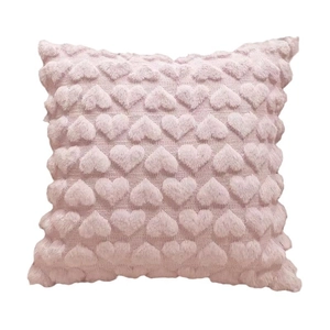 Pink heart patterned plush throw pillow with quilted texture on white background