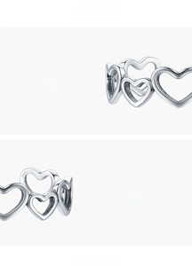Detailed macro view of S925 sterling silver hollow heart ring with engraved S925 stamp