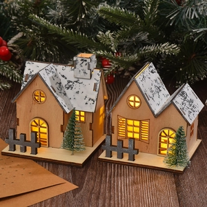 LED lighted wooden Christmas house ornaments set with warm glow for holiday tabletop decor