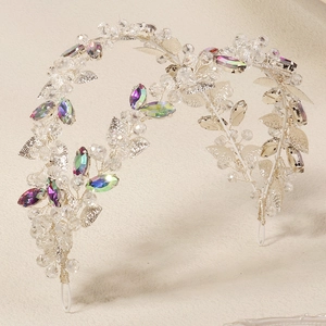 Macro detail of silver bridal headband with crystal beads and iridescent gems
