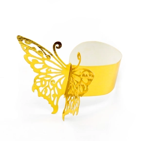Detailed laser-cut butterfly napkin ring in reflective gold finish for wedding decor