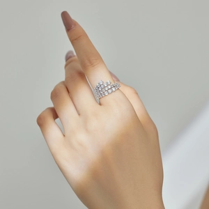 Detail view of a multi-layer S925 sterling silver ring with sparkling zircon stones