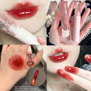 Glossy mirror finish lip glaze in Sunset Dragonfly red with cute bear packaging