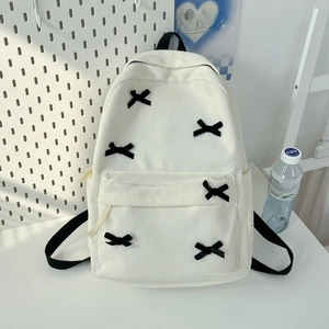 Japanese style corduroy backpack in beige with black bow decorations for students