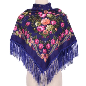 Detail of navy blue ethnic floral scarf with vibrant rose patterns and long silk tassels
