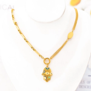 Gold Hamsa Hand necklace with colorful Evil Eye pendant on chunky mixed link chain