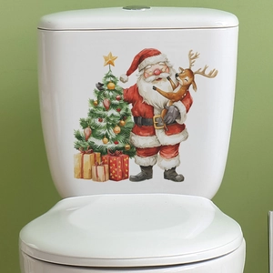 Detail of Christmas Santa and Reindeer stickers applied on a white ceramic toilet tank