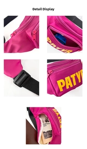 Detail view of rose red kids fanny pack showing zippers, buckle, and spacious compartments