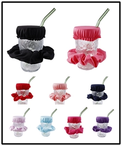 Nine colorful scrunchie drink covers on glasses with straws for anti-spiking protection