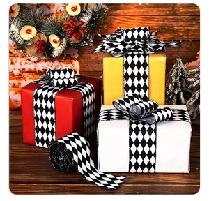 Close-up of black and white rhombic ribbon used for Christmas gift wrapping decoration