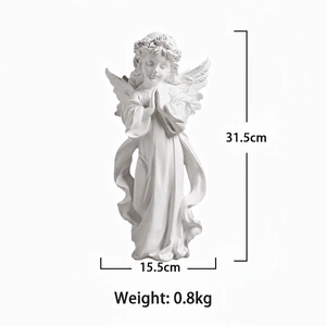 Vista detallada de estatua de ángel rezando en resina blanca con medidas de 31,5 cm y alas