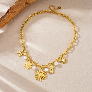 Gold stainless steel chain necklace with sun, flower pendants and white pearls