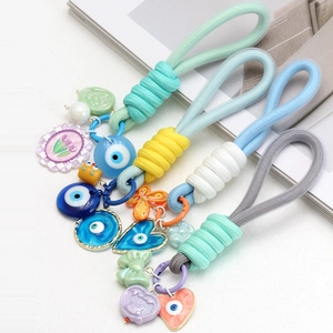 Détails de porte-clés tressés avec breloques œil et cœur en plusieurs couleurs
