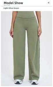 Detail shot of high-waist wide-leg athletic pants in light army green draped fabric