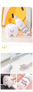 Detailed view of soft plush tooth and toothpaste dolls with creative squeeze texture