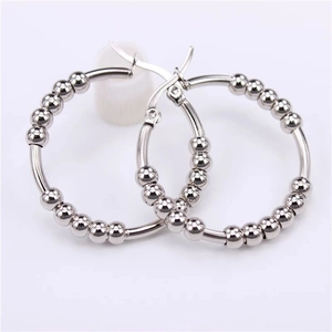 Minimalist silver stainless steel hoop earrings with polished metal beads and sleek finish