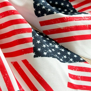 Macro shot of American flag fabric texture with vintage patriotic stars and stripes pattern