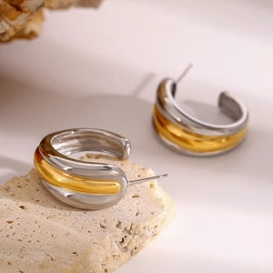 Two-tone C-shape stud earrings in polished gold and silver stainless steel design