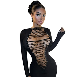 Detail shot of black bodycon dress featuring deep V-neckline with cross lacing and hollow out design
