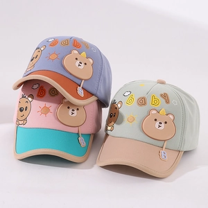 Detailed shot of baby baseball caps with 3D teddy bears and cute embroidery in three colors