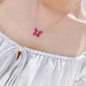 Pink butterfly pendant necklace with micro-pave crystals on a silver chain for women