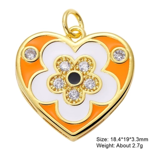 Macro detail of heart enamel pendant with orange petals, white zircon, and size specs