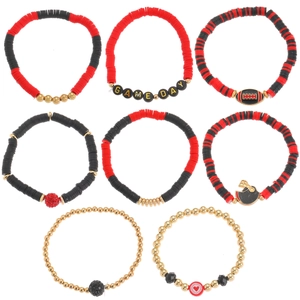 Detailed close-up of 8-piece Super Bowl themed Game Day elastic bracelets with Heishi beads