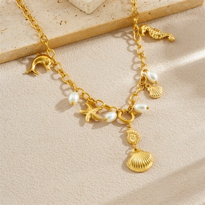 Gold-plated stainless steel necklace with starfish, seahorse, and pearl charms