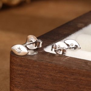 Exquisite S925 sterling silver evil eye stud earrings with shimmering zircon inlays