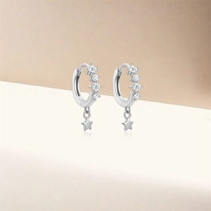 Detailed close-up of S925 silver star hoop earrings featuring sparkling crystal charms